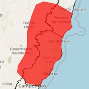 Mapa do Espírito Santo com mancha vermelha indicando alerta de Grande Perigo do INMET para chuvas intensas e alagamentos.