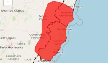 Mapa do Espírito Santo com mancha vermelha indicando alerta de Grande Perigo do INMET para chuvas intensas e alagamentos.
